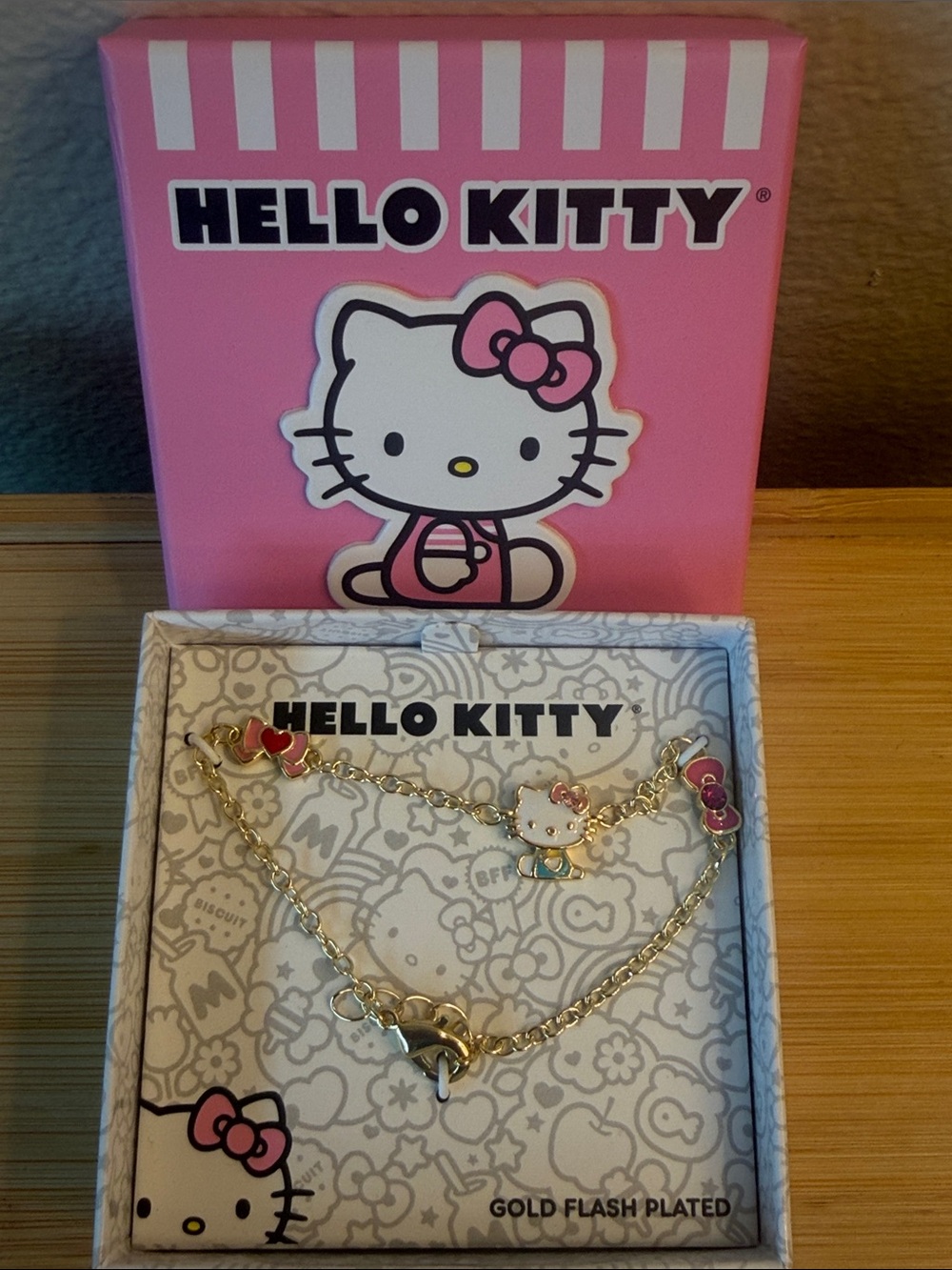 Hello Kitty Gold-Tone Kids Bracelet with Pink and White Charms